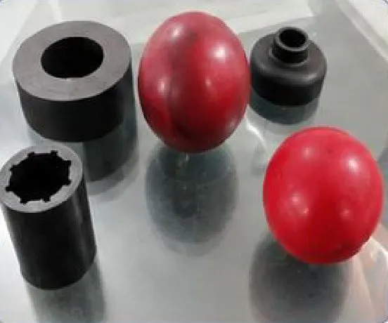 Black rubber bushes and red rubber balls